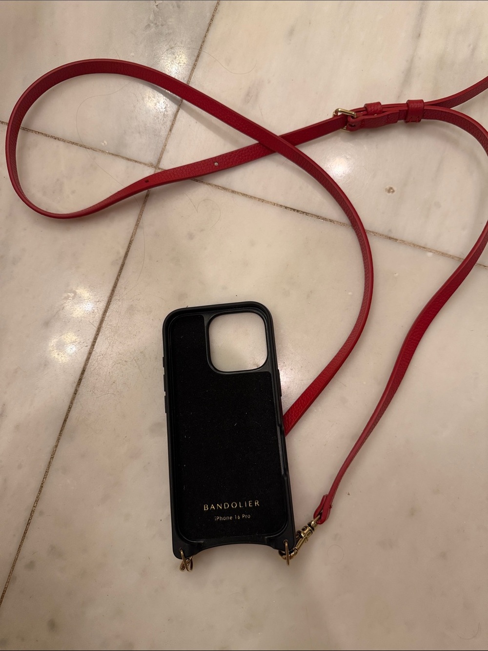 Bandolier Black Leather Phone Case with Red Adjustable Strap iPhone 16 Pro
